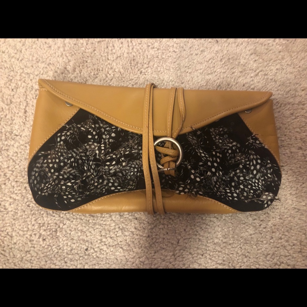 Clutch feathered with wrap closure